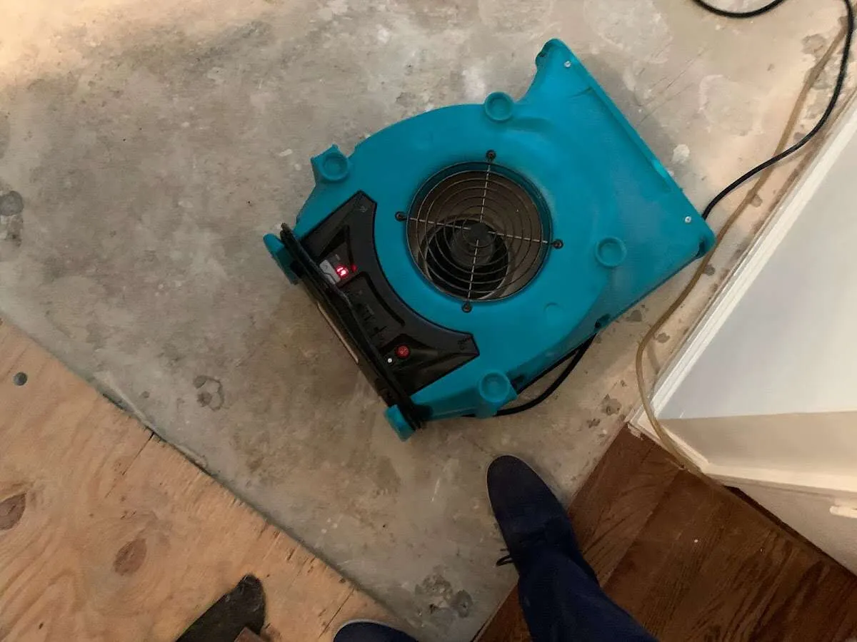 Air mover drying subfloor during Leak Detection & Repair in Menlo Park